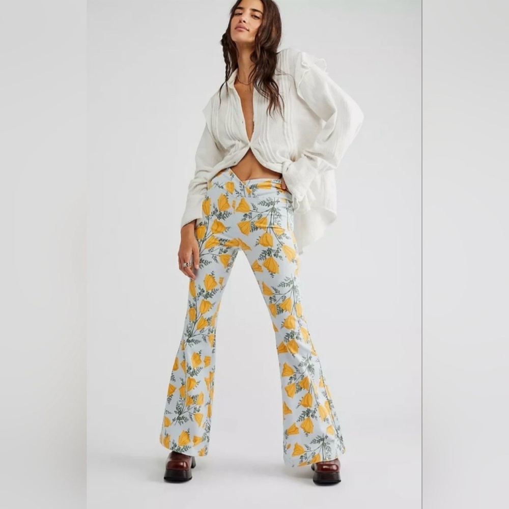 Free People Venice Beach flare jeans in Sky Combo Cali Poppies